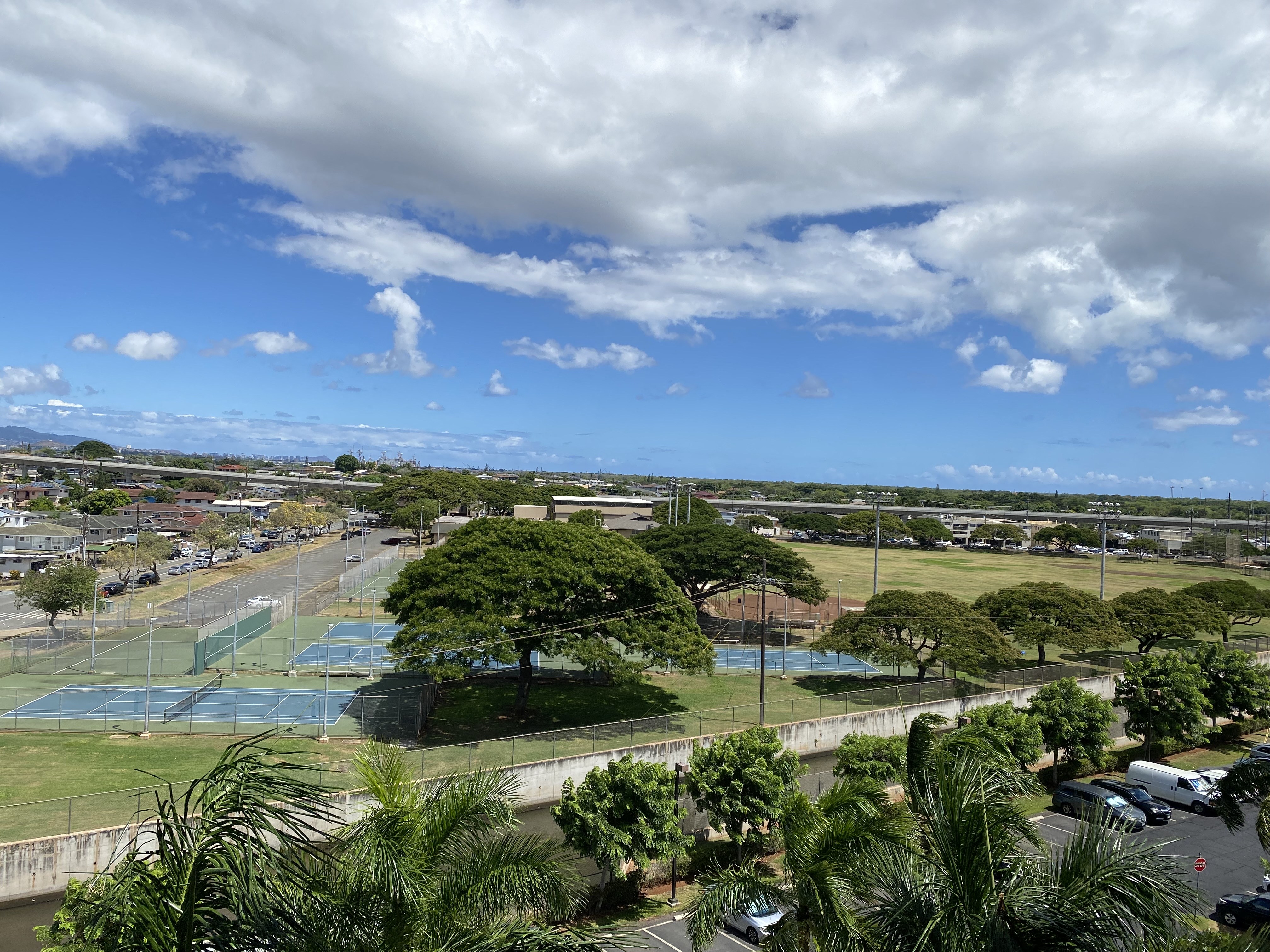 a view of the tennis courts from the apartment